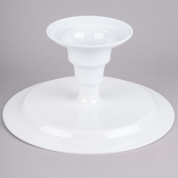 A white pedestal with a white base on top.