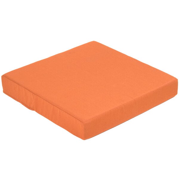 An orange square cushion set for BFM Seating Aruba armchairs on a white background.