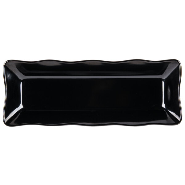 A black rectangular melamine tray with wavy edges.