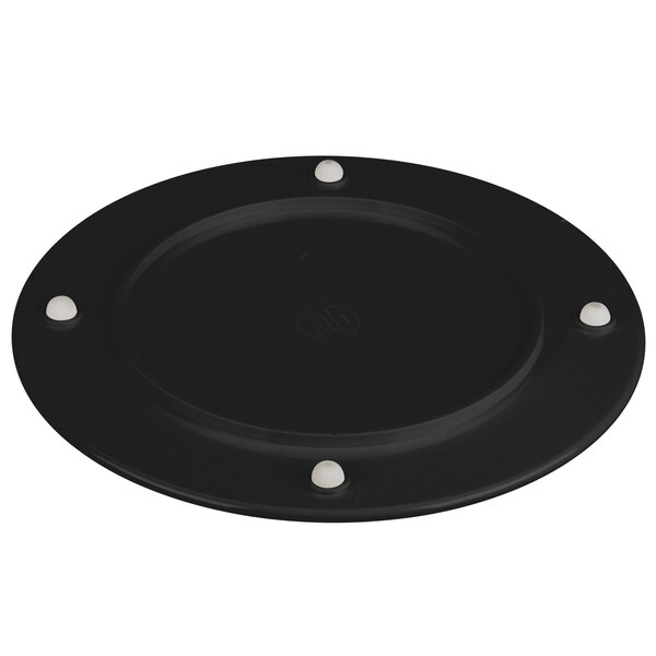 A black Elite Global Solutions melamine plate with holes on a pedestal.