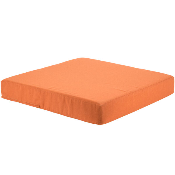 An orange square cushion for a BFM Seating Aruba ottoman on a white background.