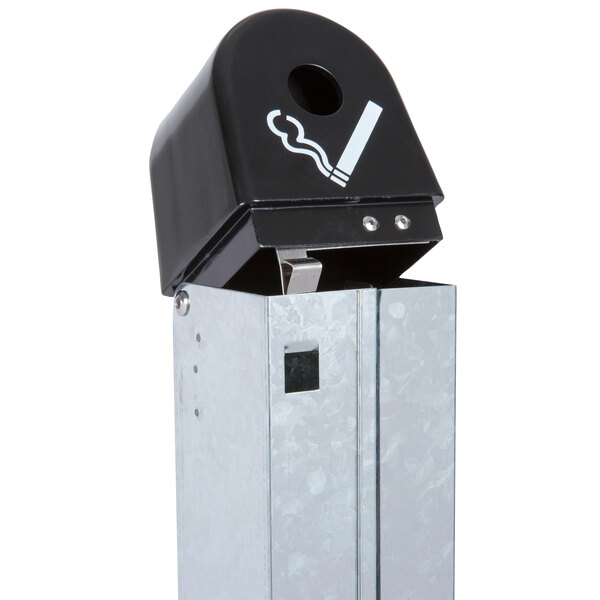 A black Rubbermaid GroundsKeeper cigarette receptacle on a counter.
