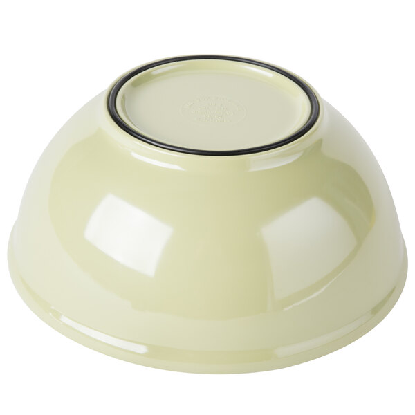 A white melamine bowl with a black rim.