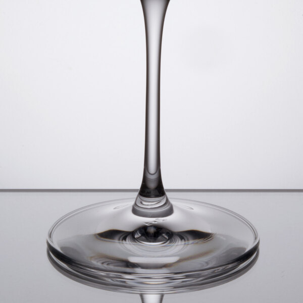 A clear Spiegelau cocktail glass with a stem.