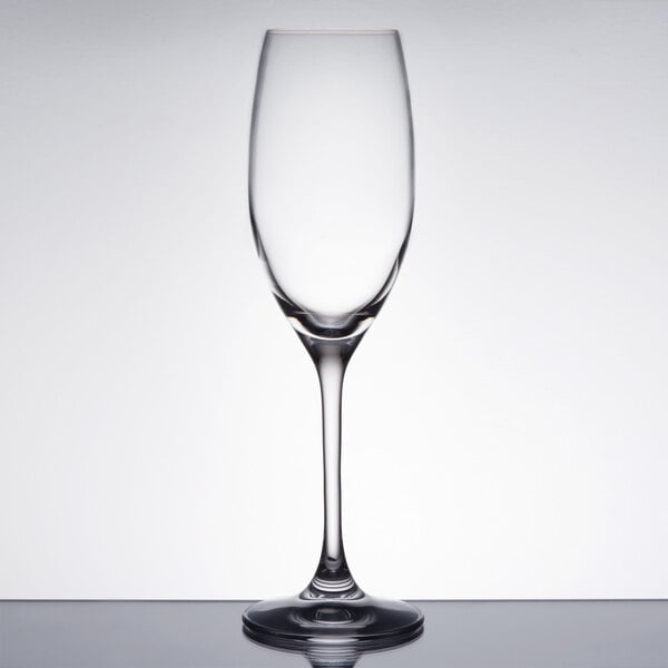 A clear Spiegelau Vino Grande flute glass on a table.