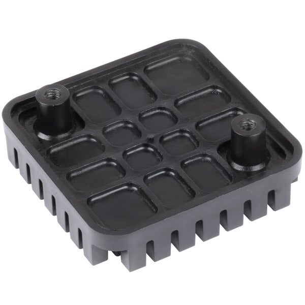 A black plastic Garde push block with holes.