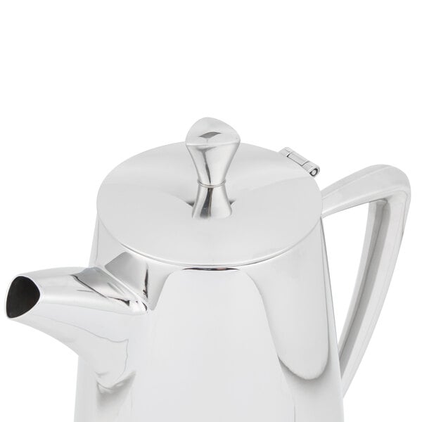 A Vollrath stainless steel coffee pot with a handle.