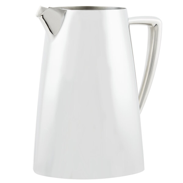 A Vollrath stainless steel pitcher with a handle.