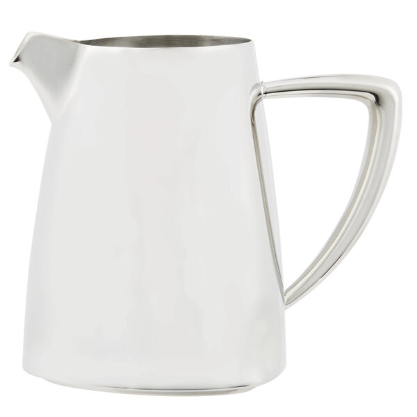 A Vollrath stainless steel creamer with a handle.