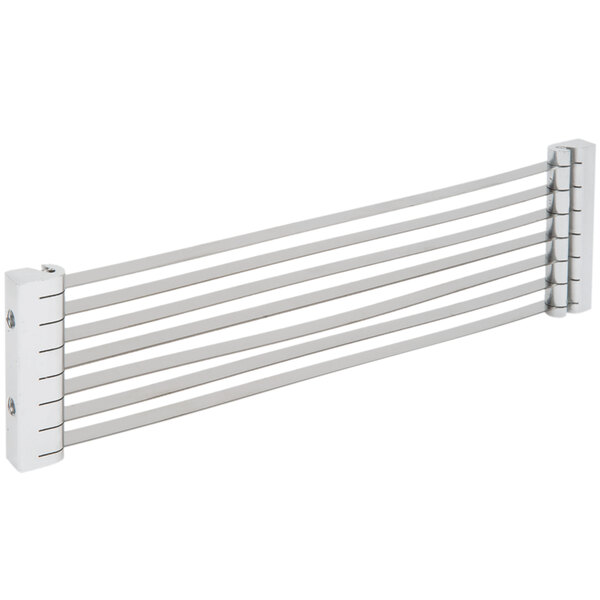 A white metal Garde tomato slicer blade assembly with black lines.