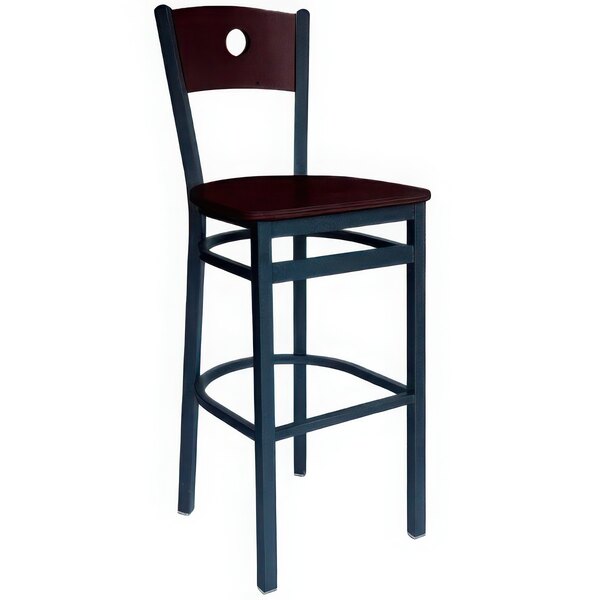 A BFM Seating black metal bar height chair with a mahogany wooden seat and back.