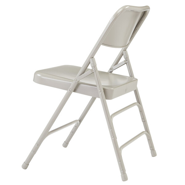 A close-up of a gray National Public Seating metal folding chair with triple-brace support.
