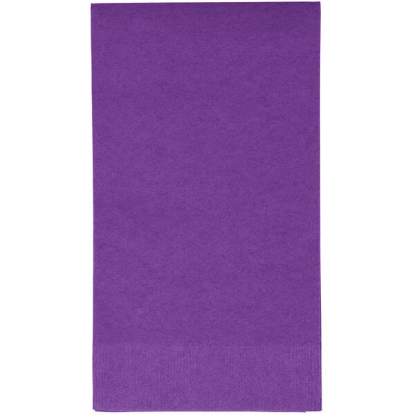 A purple rectangular Creative Converting guest towel with a white border.