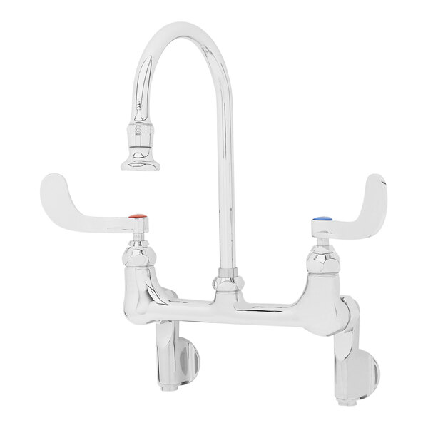 A silver T&S wall mounted surgical sink faucet with 4" wrist action handles.