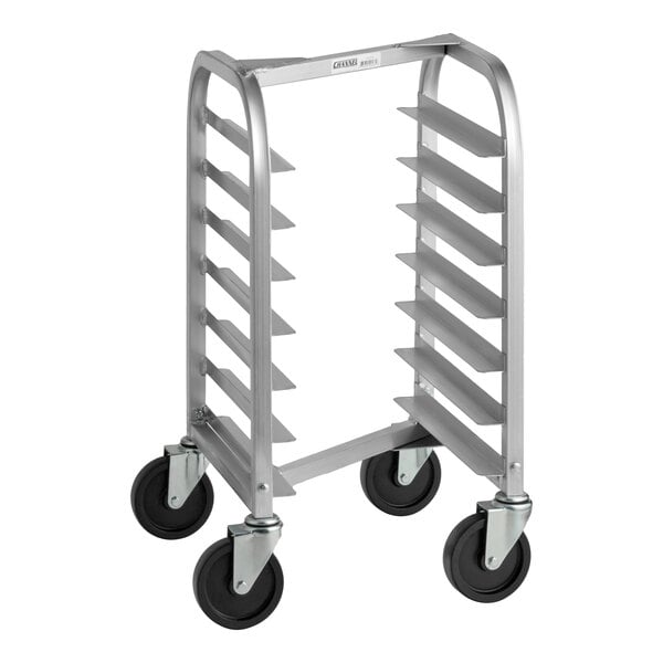 A metal undercounter nesting bun and sheet pan rack with seven slots and four caster wheels.