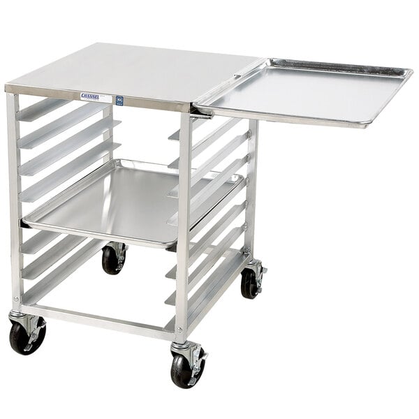 A silver Channel undercounter sheet pan rack on wheels.