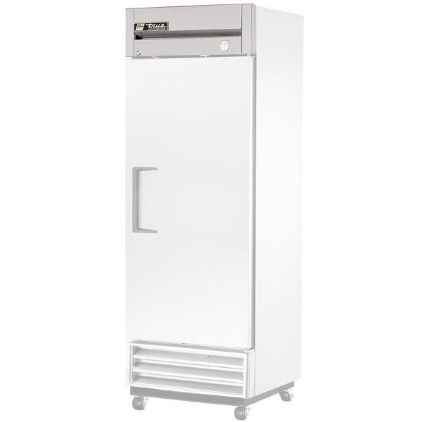 A True white refrigerator door with a handle and a rainshield assembly.