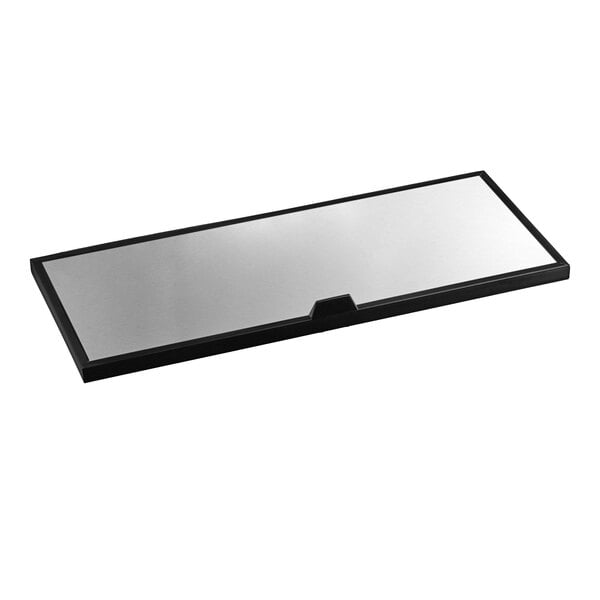 A rectangular black and white lid with a black frame.
