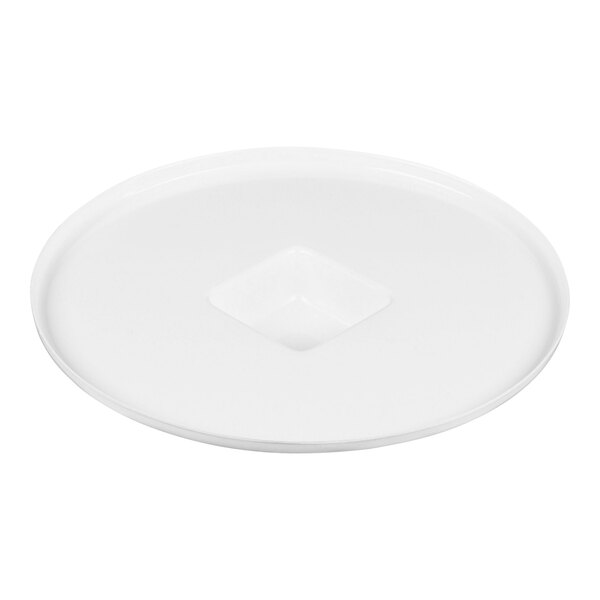 A round white can cover with a slightly raised center.