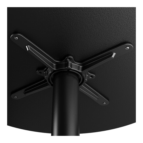 A black metal FLAT Tech table base with a cross.