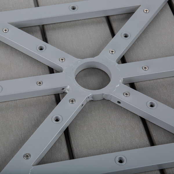 A BFM Seating aluminum table top with a synthetic teak finish and holes in a square pattern.