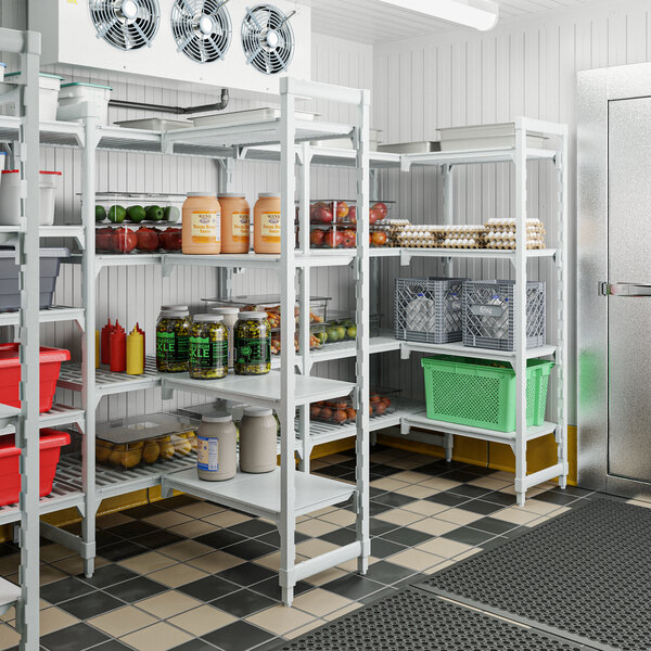 A Cambro Premium Camshelving unit in a storage room.