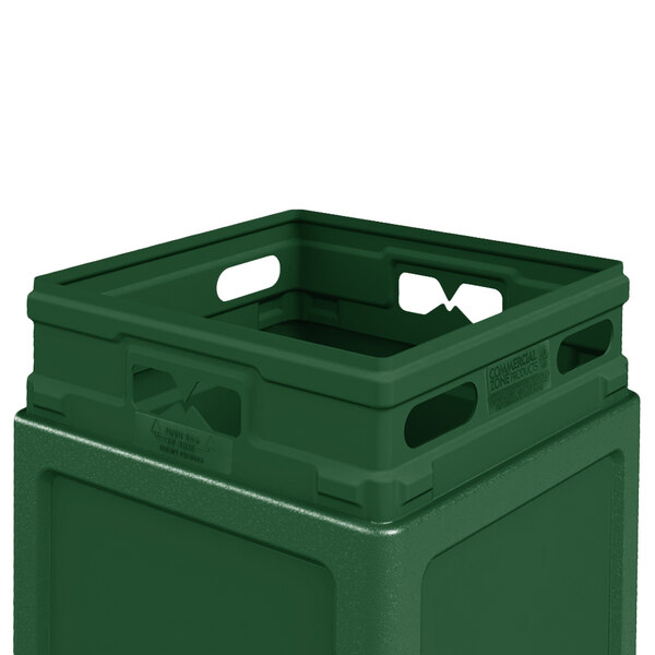 A green plastic Commercial Zone PolyTec waste container with dome lid and two holes in the top.