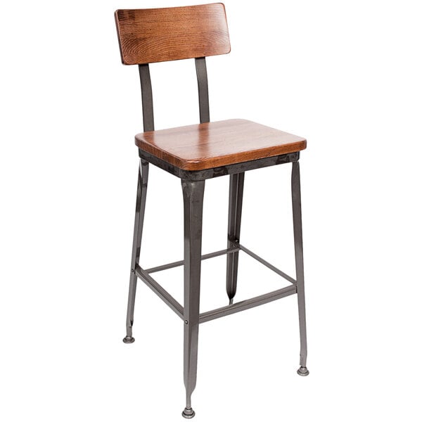 A BFM Seating Lincoln bar height chair with a clear coated steel frame, wooden back, and wooden seat.