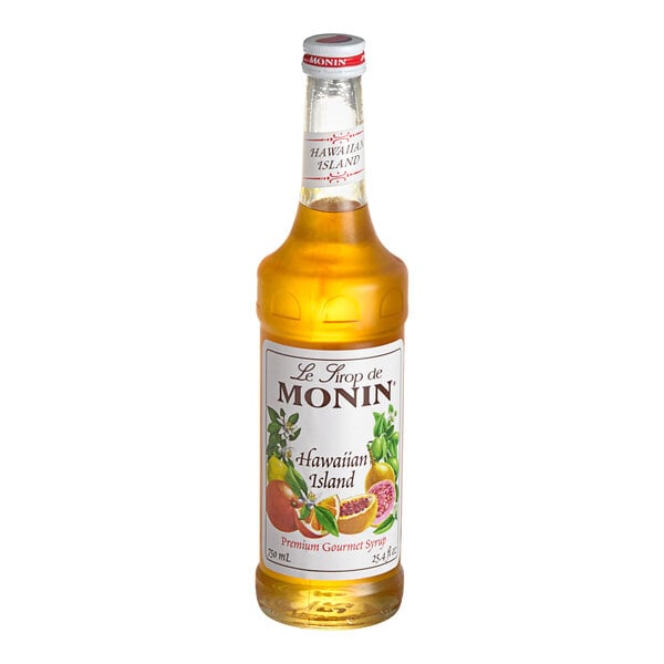 A Monin Hawaiian Island fruit syrup bottle on a white background with a label.