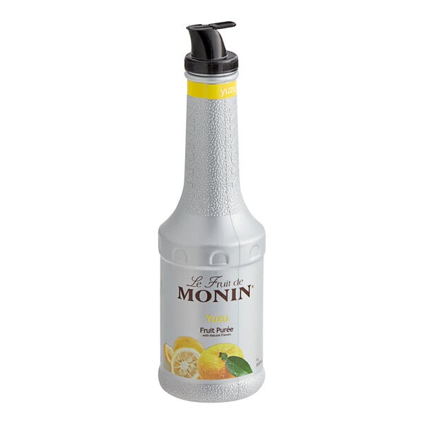 A white plastic bottle of Monin Yuzu Fruit Puree with a black lid.