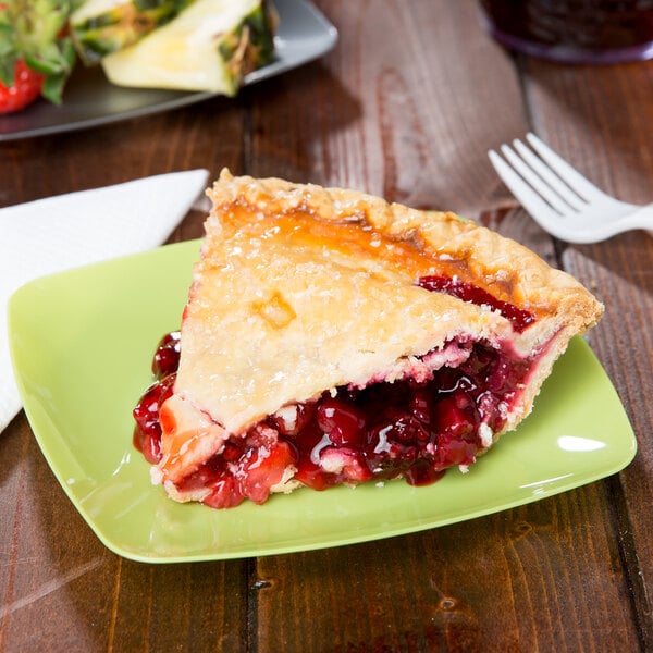 A slice of pie on a green Fineline square dessert plate.