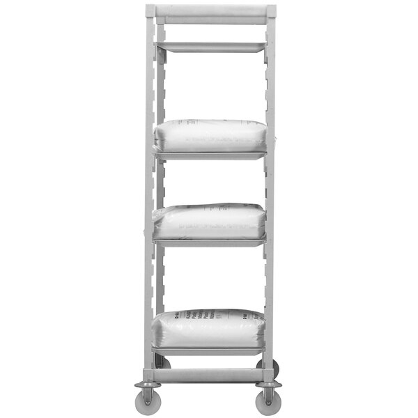 A white cart with three shelves on it.