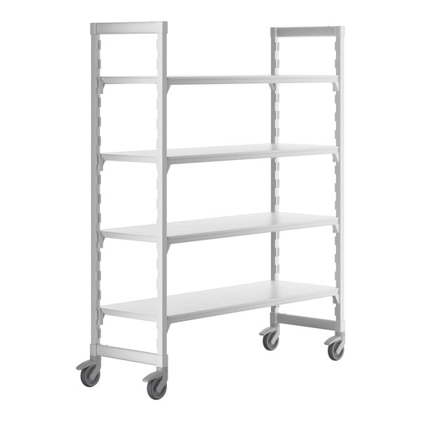A white Cambro Camshelving Premium mobile shelving unit with 4 solid shelves and wheels.