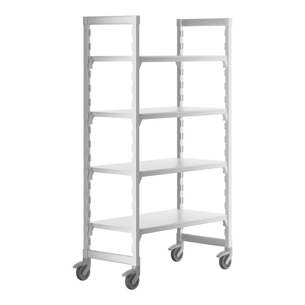 A white Cambro Camshelving® Premium mobile shelving unit with 4 shelves on wheels.