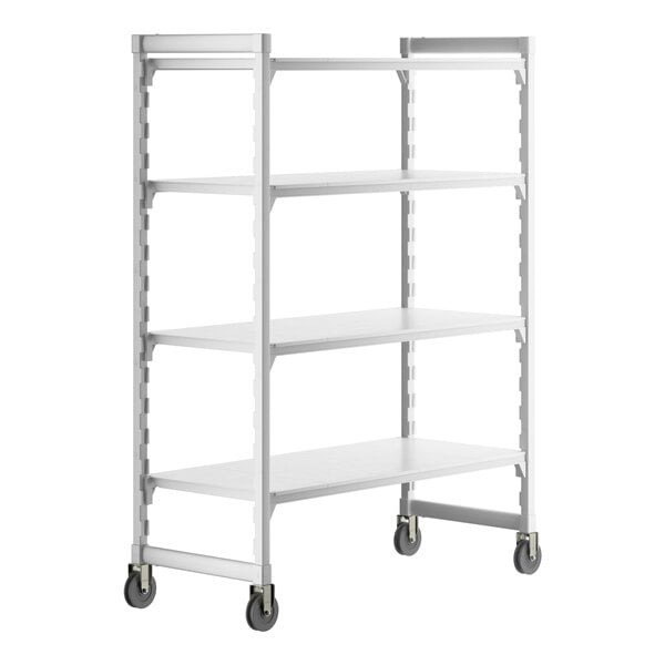 A white Cambro Camshelving® Premium mobile shelving unit with 4 solid shelves and wheels.