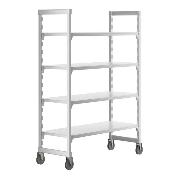 A white Cambro Camshelving® premium high density mobile shelving unit with wheels.