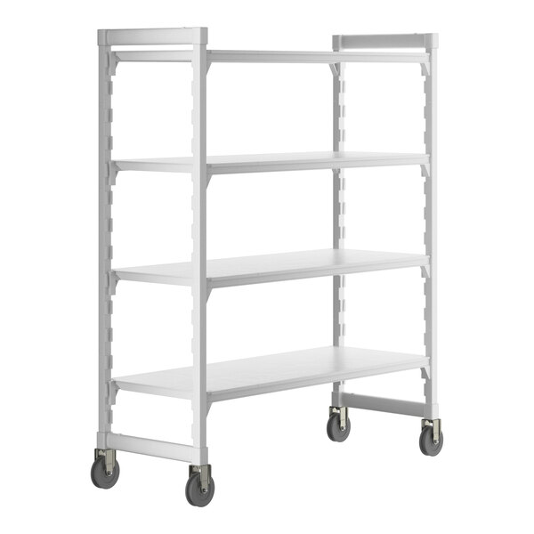 A white Cambro Camshelving® Premium mobile shelving unit with 4 solid shelves and wheels.