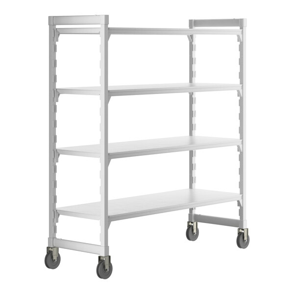 A white Cambro Camshelving® Premium mobile shelving unit with 4 solid shelves and wheels.
