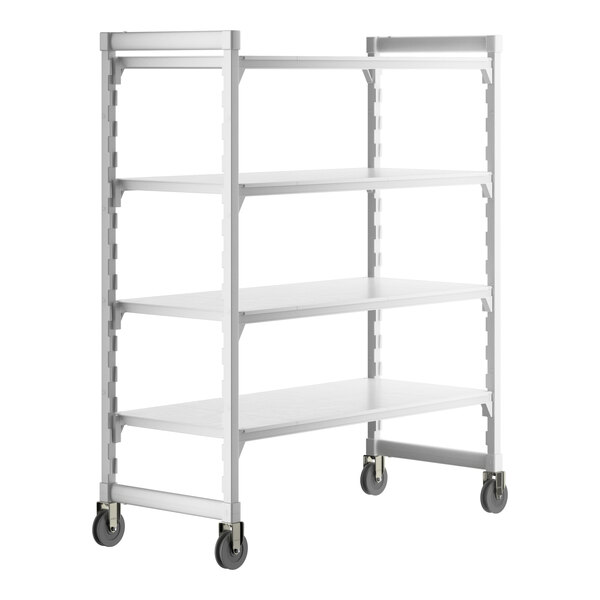 A white Cambro Camshelving Premium mobile shelving unit with 4 solid shelves and wheels.