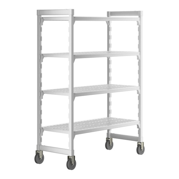A white metal Cambro Camshelving® Premium mobile shelving unit with vented shelves.