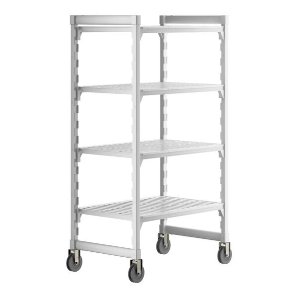 A white Cambro Camshelving Premium mobile shelving unit with 4 vented shelves on wheels.