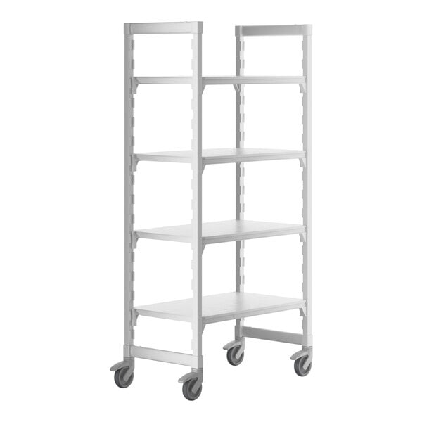 A white Cambro Camshelving® Premium mobile shelving unit with 4 shelves on wheels.