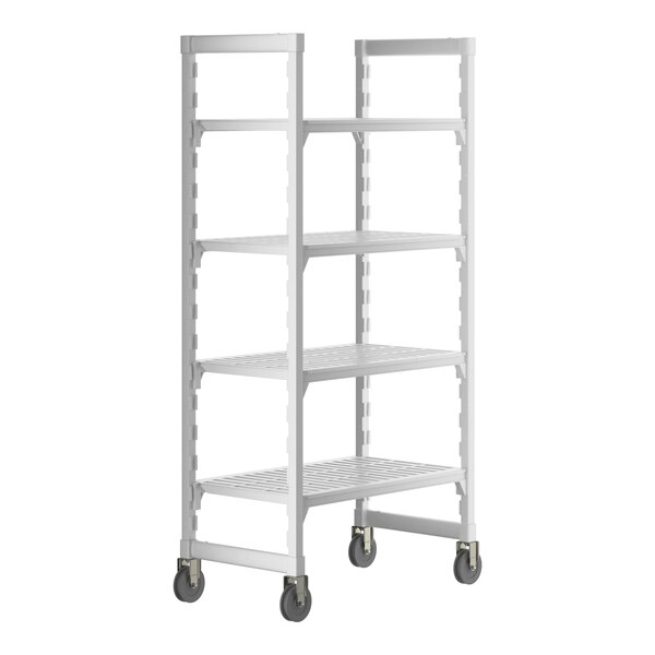 A white plastic Cambro Camshelving® Premium mobile shelving unit with wheels.
