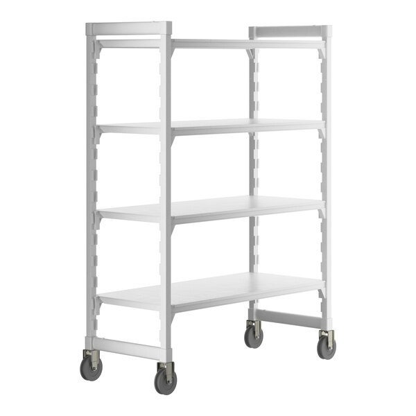 A white Cambro Camshelving® Premium mobile shelving unit with 4 solid shelves and wheels.
