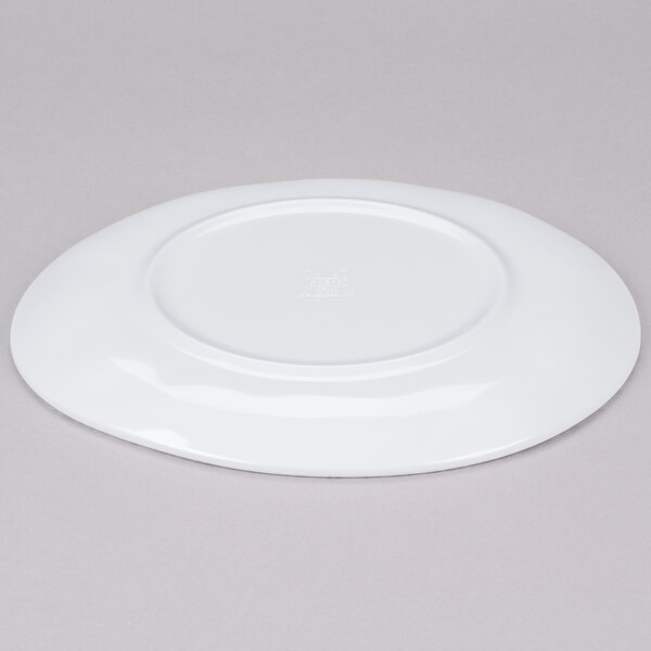 A white GET Urban Mill coupe plate on a gray surface.