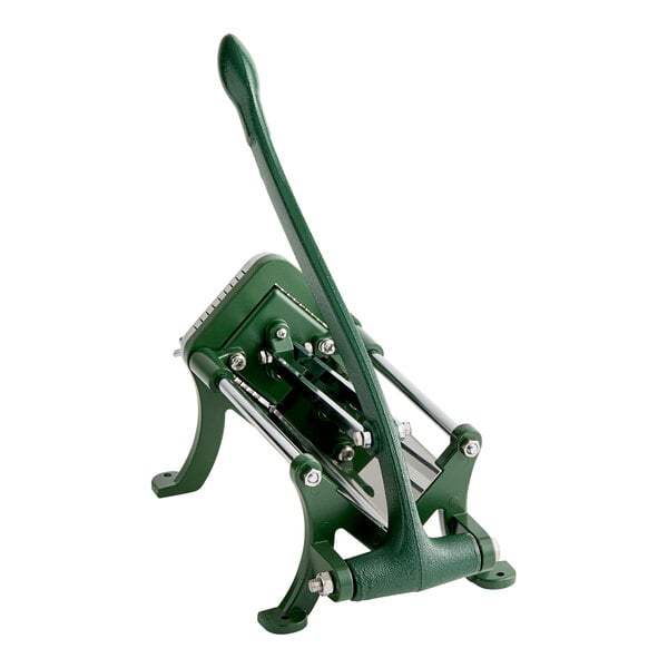 A green manual French fry cutter with a long handle and suction feet for stability.