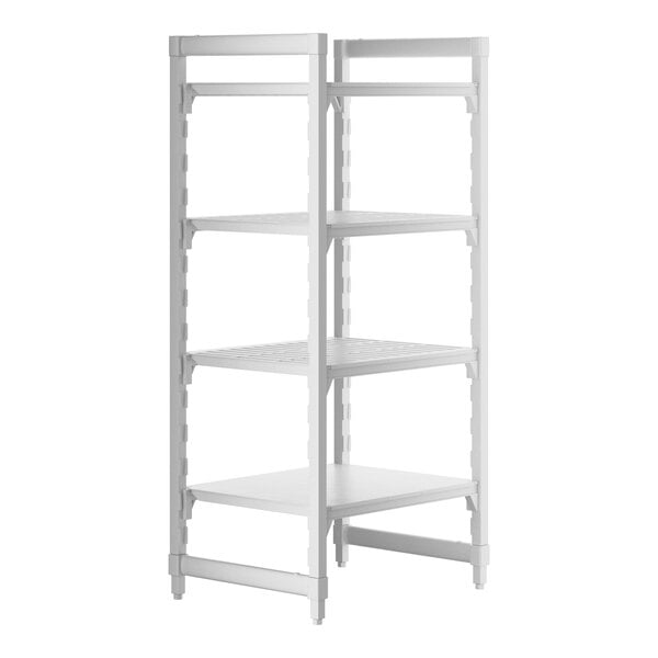 A white plastic Cambro shelving unit with vented and solid shelves.