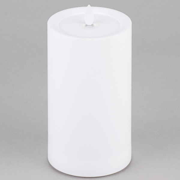 A white rectangular Sterno Mirage flameless LED candle with a black border.