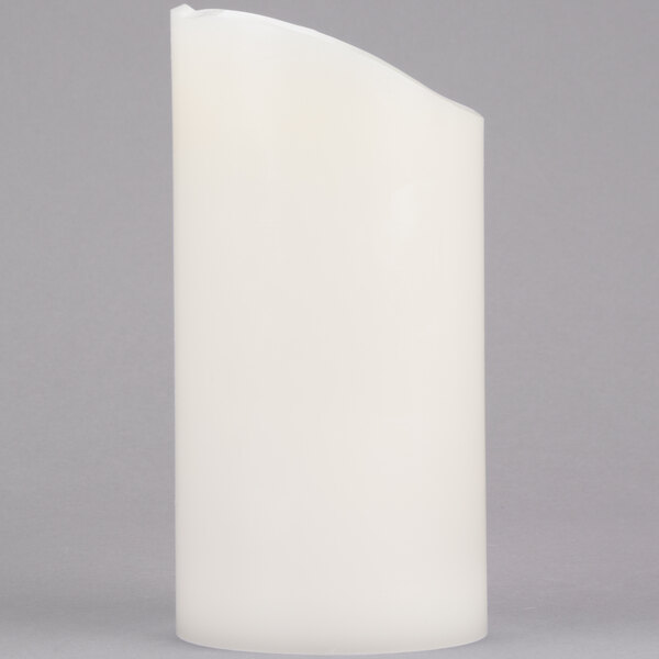 A white Sterno Mirage programmable LED candle in a white container with a black lid.