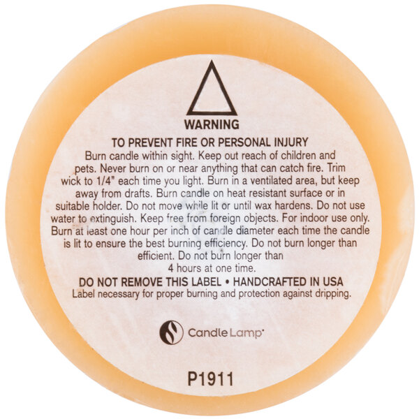 A label on a white surface with text that says "Sterno Beeswax Pillar Candle"